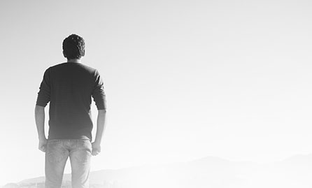 Man looking into a distant landscape